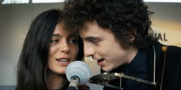 Monica Barbaro as Joan Baez and Timothée Chalamet as Bob Dylan in "A Complete Unknown."