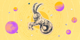 Paper cutout of the Capricorn zodiac on a yellow background