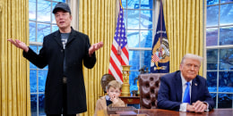 Elon Musk and his son X Musk during an executive order signing in the Oval Office 
