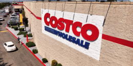 Costco logo is displayed on the exterior of a Costco store.