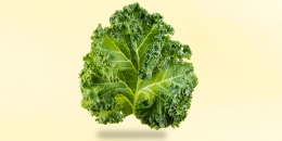 Kale leaf close-up on a bright background.