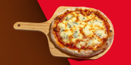 Pizza on a vibrant red background.