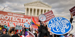 Abortion-rights supporters stage a counter protest outside the Supreme Court during the March for Life rally on Jan. 20, 2023.