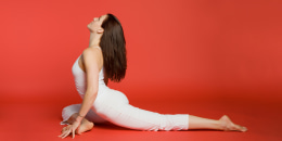 Woman pigeon pose.
