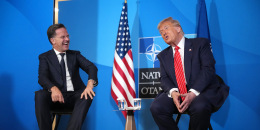 General Mark Rutte and Donald Trump laughing while talking