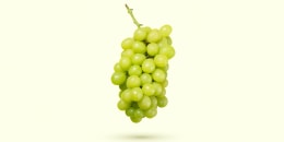 White Grape Levitation on Colored Background