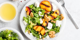 Summer salad with grilled peaches and feta cheese.
