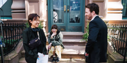 Celine Song on set with Dakota Johnson and Chris Evans.