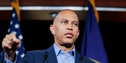 Hakeem Jeffries speaks to reporters