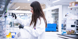 People work in the lab at Xencor's biopharmaceutical company in Pasadena on Wednesday, April 26, 2023. 