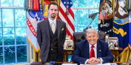 Economist E.J. Antoni stands, left, and President Donald Trump sits at his desk in the Oval Office
