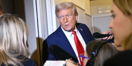 President Donald Trump speaks to reporters while in flight on Air Force One, en route Joint Base Andrews on September 21, 2025. 