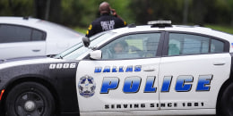 A police car is parked outside