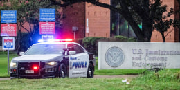 A car parked near the U.S. Immigration and Customs Enforcement building