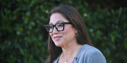 Labor Secretary Lori Chavez-DeRemer prepares for a television interview outside the White House on Sept. 5, 2025. 