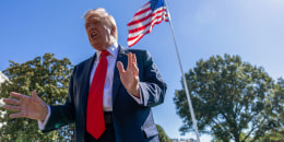 President Donald Trump talks to reporters at the White House