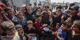 Palestinians celebrate ceasefire announcement in Gaza.