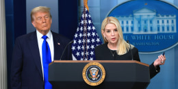 U.S. Attorney General Pam Bondi speaks alongside President Donald Trump at the White House.