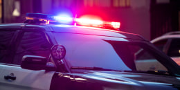Photo of a police siren light on the street.