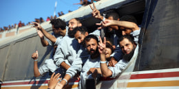 Buses carrying Palestinians released from Israeli prisons under a Gaza ceasefire and hostage exchange deal with Palestinian factions arrive in Khan Yunis.