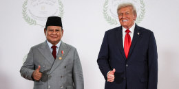 Donald Trump greets Prabowo Subianto.