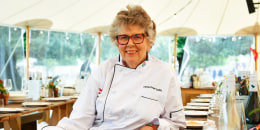 Restaurateur Dame Prue Leith poses for a portrait as she prepares to host a long table banquet during Wilderness Festival 