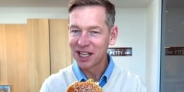 McDonald's CEO Chris Kempczinski tries the fast-food giant's new Big Arch burger.
