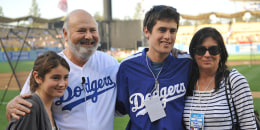 June 04, 2010 - Los Angeles, California, U.S - 04 June 2010: The Reiner family from left daughter Romy Reiner, Rob Reiner, Jake Reiner, and Michele Singer Reiner pose for a picture before the Dodgers game. The Los Angeles Dodgers defeated the Atlanta Bra