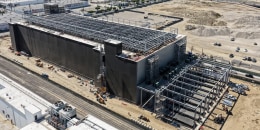 An aerial view of a aerial view of a 49.5 megawatt three-level data center under construction.