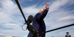 Image: U.S. President Trump turns to walk away after speaking to reporters following his arrivial aboard Air Force One at Joint Base Andrews, Maryland