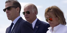 Image: U.S. Vice President Joe Biden, centre, his son Hunter Biden, left, and his sister Valerie Biden Owens, right, joined by other family members during a ceremony to name a national road after his late son in the village of Sojevo, Kosovo.