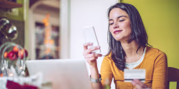Image: Young Woman Shops At Home