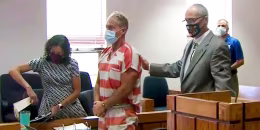 Barry Morphew, center, appears in court in Salida, Colo., on May 6, 2021.