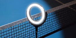 Photo illustration of ring light on tennis court 