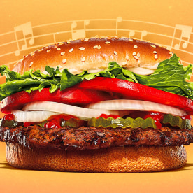 A Whooper on a color background with musical notes playing behind the Whooper