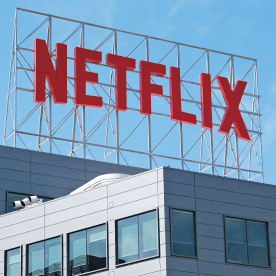 The Netflix logo is seen on top of their office building.