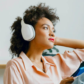 Woman listens to a podcast