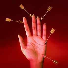 A photo of a hand with tiny arrows in it symbolizing Sagittarius 2024.