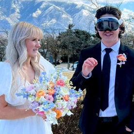 A groom wore a VR headset in his wedding photos
