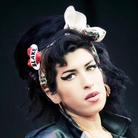 Amy Winehouse on stage at T in The Park.