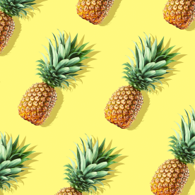 Colorful fruit pattern of whole pineapples.