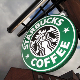 The Starbucks logo hangs outside one of the company's cafes in Northwich on 3 July, 2008 in Northwich, England. 
