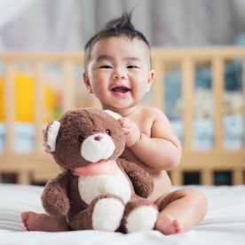 Baby with stuffed bear
