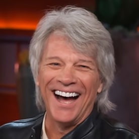 Jon Bon Jovi laughing / Kelly Clarkson in shock during her performance