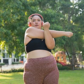 Woman stretching in park