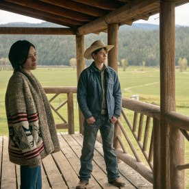 Kelsey Asbille as Monica Long, Brecken Merrill as Tate Dutton, and Luke Grimes as Kacey Dutton in "Yellowstone."
