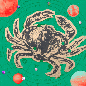 Paper cutout of the cancer zodiac on a green background