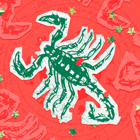 Paper cutouts of the Scorpio zodiac on a red background