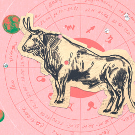 Paper cutout of the tauros zodiac on a orange background
