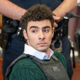 Luigi Mangione sits on court